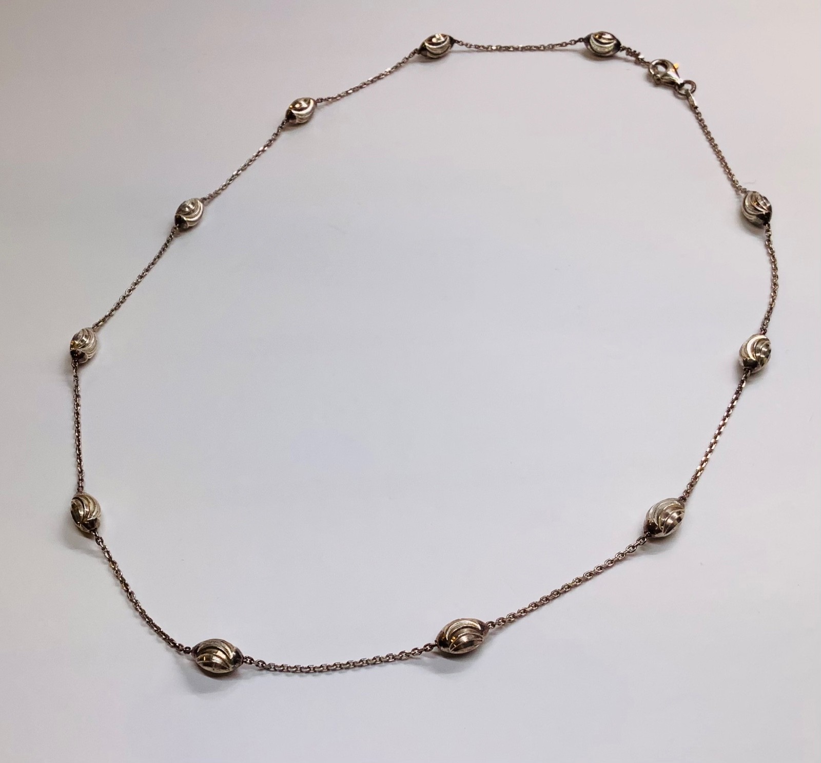 Milor Sterling Silver Unique Swirl Moon Cut Oval Bead Station Necklace 18” Italy