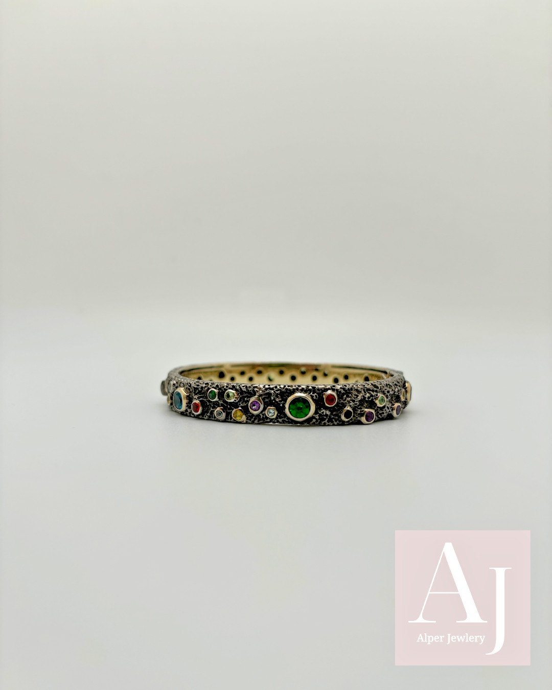 Artjouel 925 Silver and Gold plated bangel with natural and synthetic stones