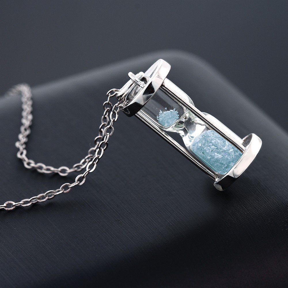 925 Silver Hourglass Pendant and 0.75 Ct Aquamarine Dust 18″ Chain
