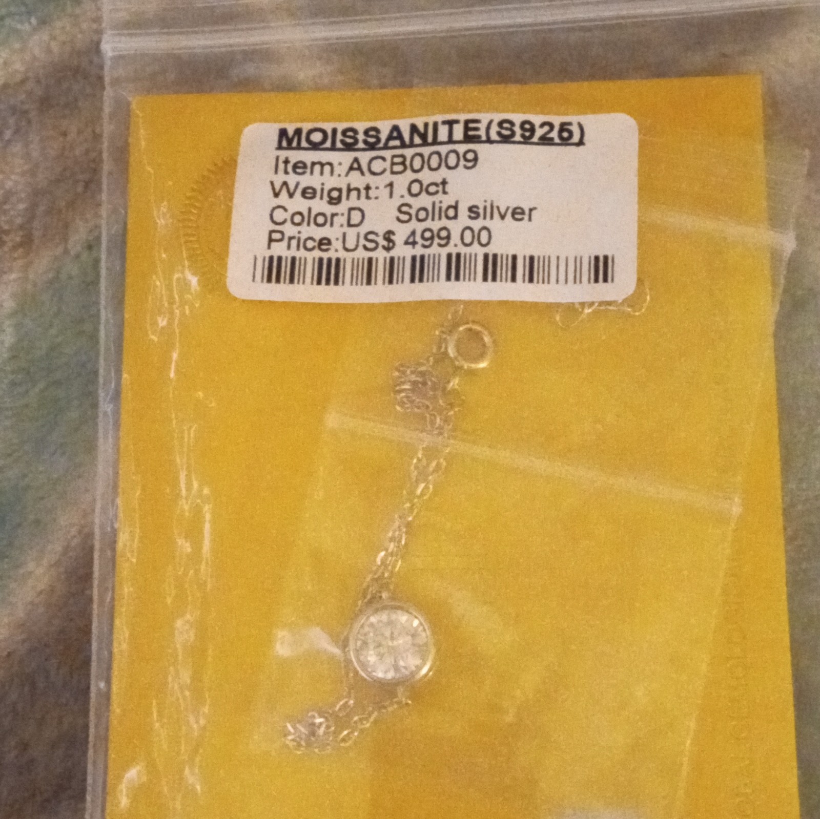 Moissanite 1.0ct D Color Round Bezel Set Bracelet — .925 SS Cable Chain