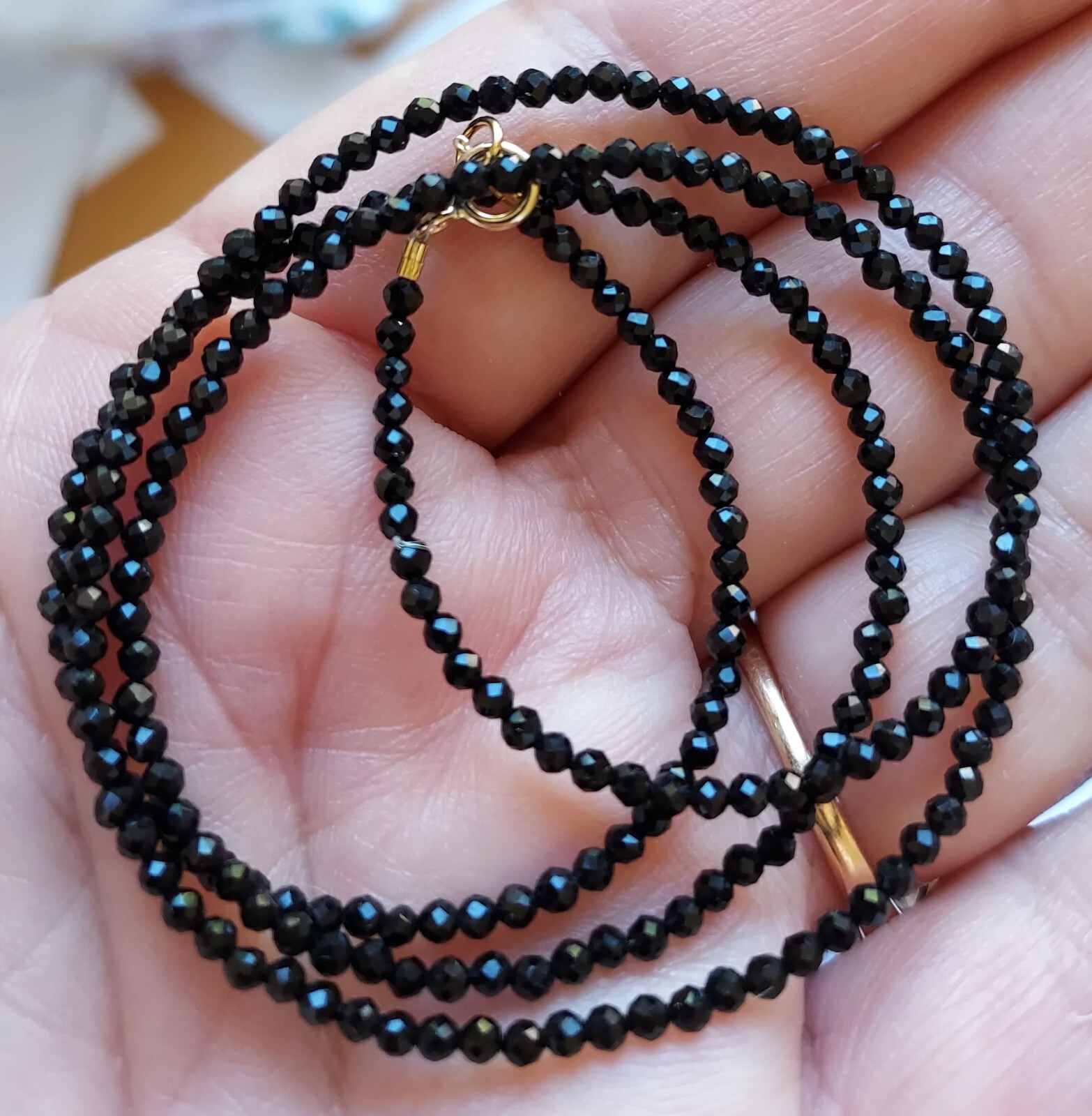 Black spinel beads and 14 k yellow gold ,2.5 mm, 17″ or 16″
