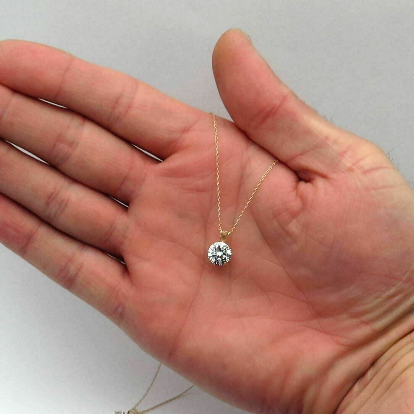 2 Ct Round Cut Solitaire Moissanite Pendant Necklace In 14k Yellow Gold Finish