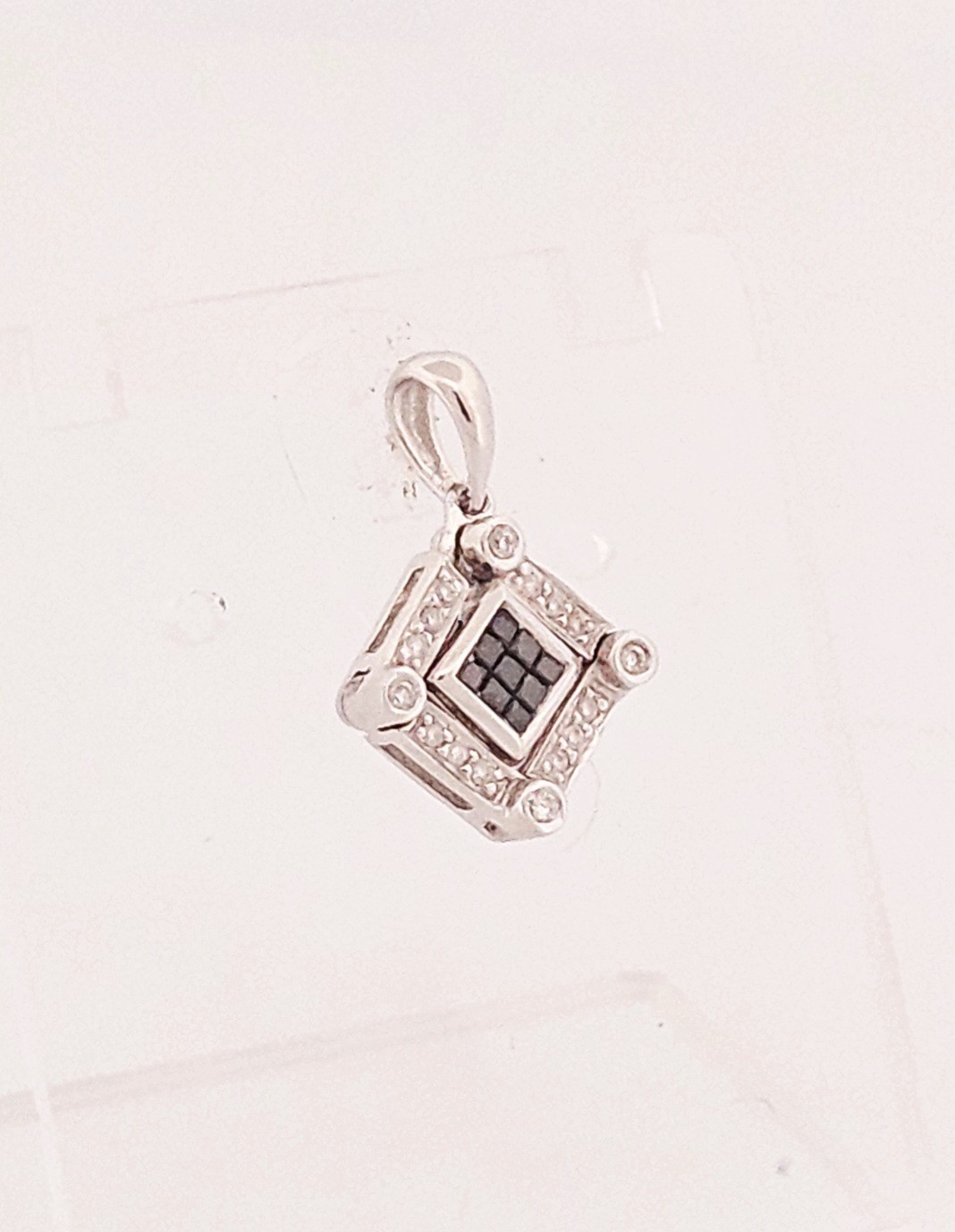 Sterling silver convertible genuine black & white diamond pendant