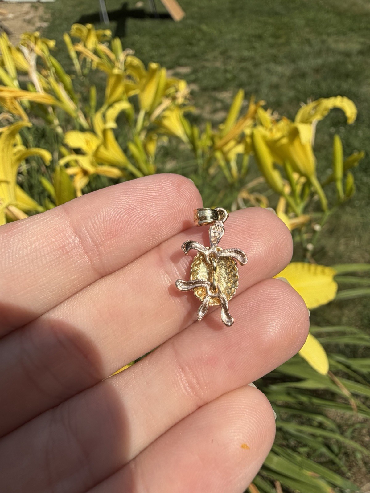 The most adorable 14k gold turtle pendant! The legs move- really a unique piece