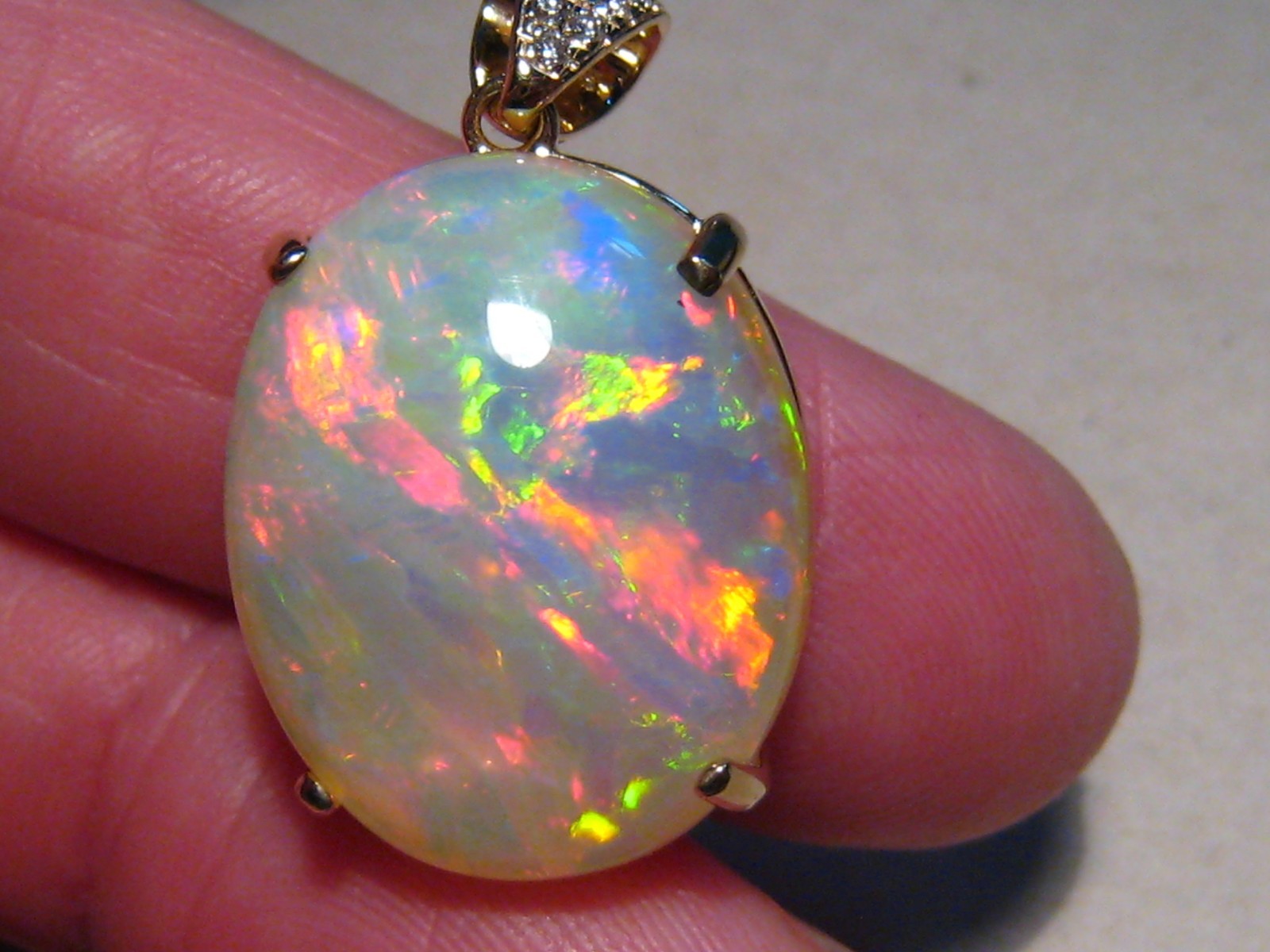 Large 25 ct Welo Opal & Diamond Pendant , Solid 14 k Gold , Brightness 5+
