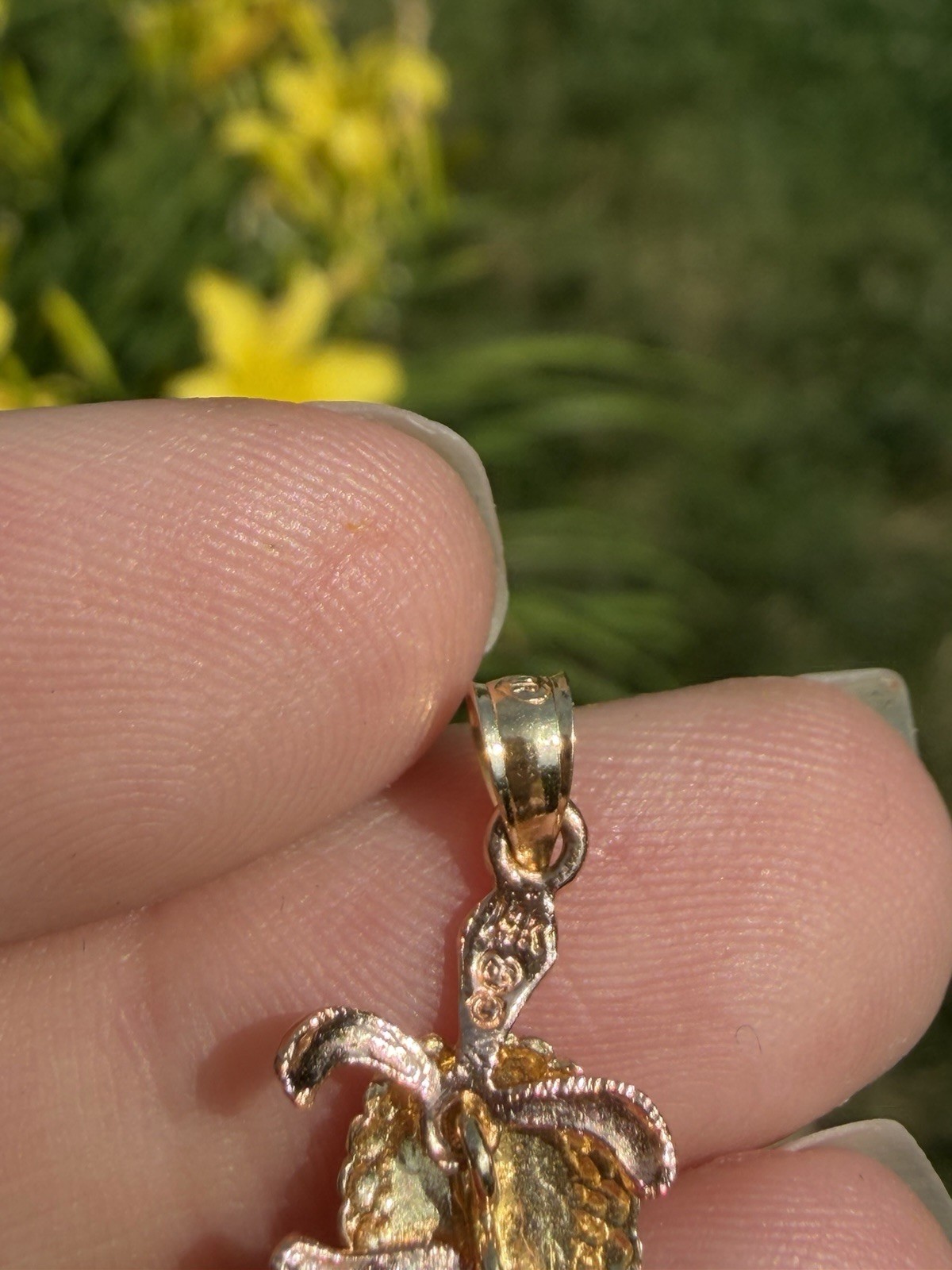 The most adorable 14k gold turtle pendant! The legs move- really a unique piece