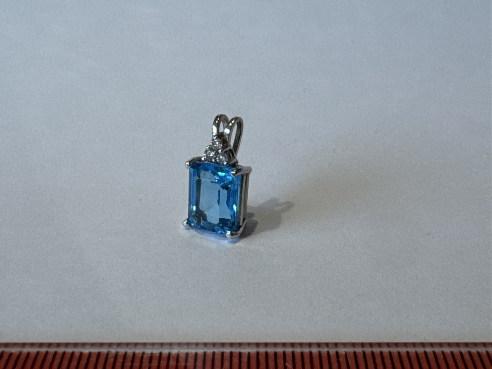 10K White Gold Pendant with Swiss Blue Topaz and White Diamond
