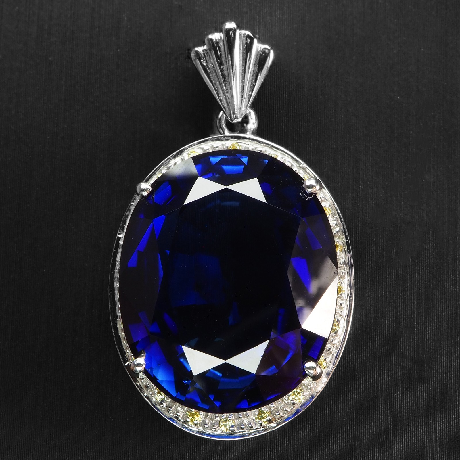 Striking Midnight Blue Sapphire 31.40Ct 925 Sterling Silver White Gold Pendants