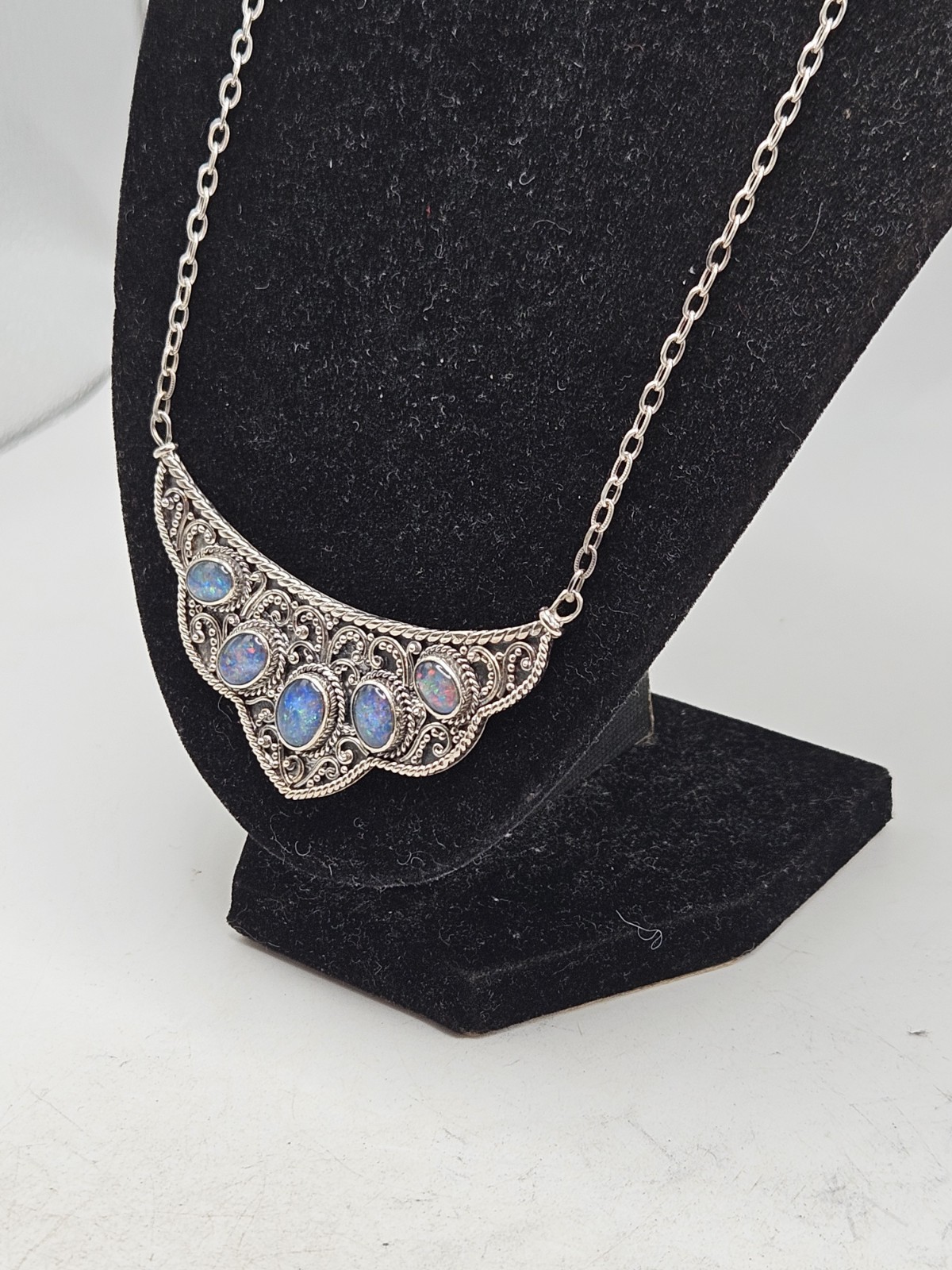 Sterling Silver Bib Style Necklace With 5 Oval Bezel Set Opals. 20″ Marked. 925.