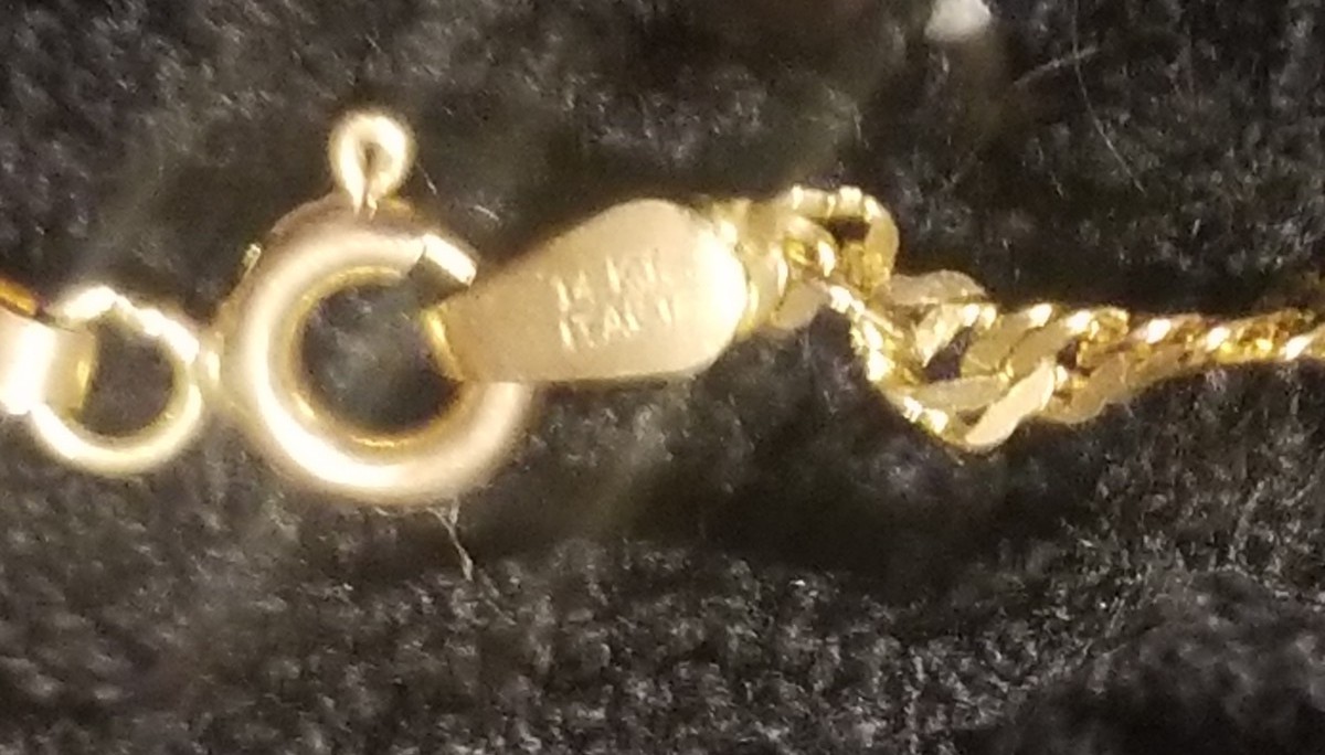 14k Gold Necklace & 10k Gold Emerald Pendant. 3 grams 20″ Yellow Gold Necklace