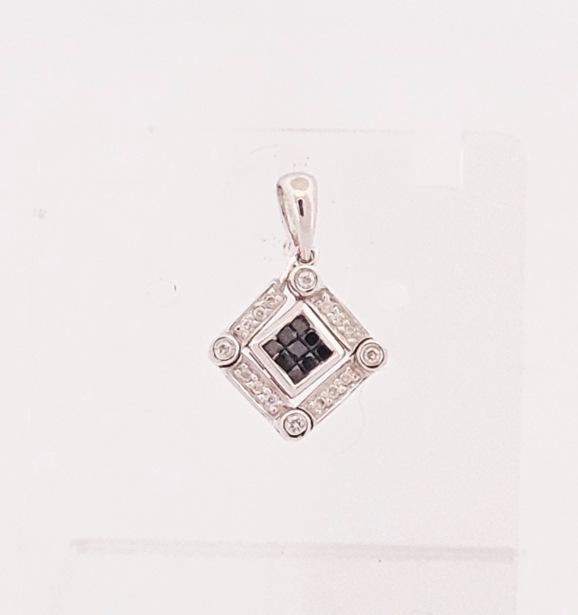 Sterling silver convertible genuine black & white diamond pendant