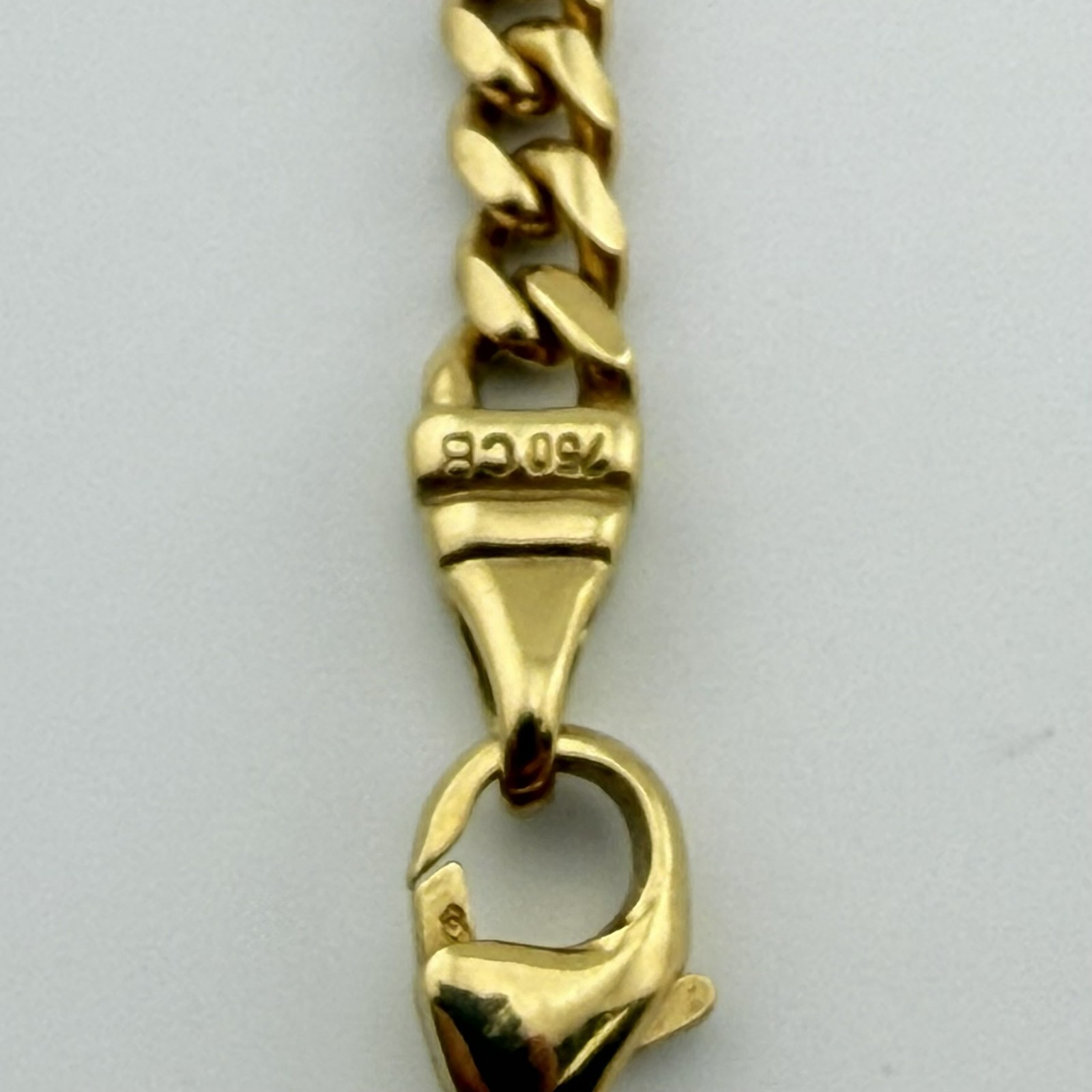 EMERALD CROSS PENDANT – 18K YG – 5 CTW COLUMBIA EMERALD – 21IN CUBAN LINK CHAIN