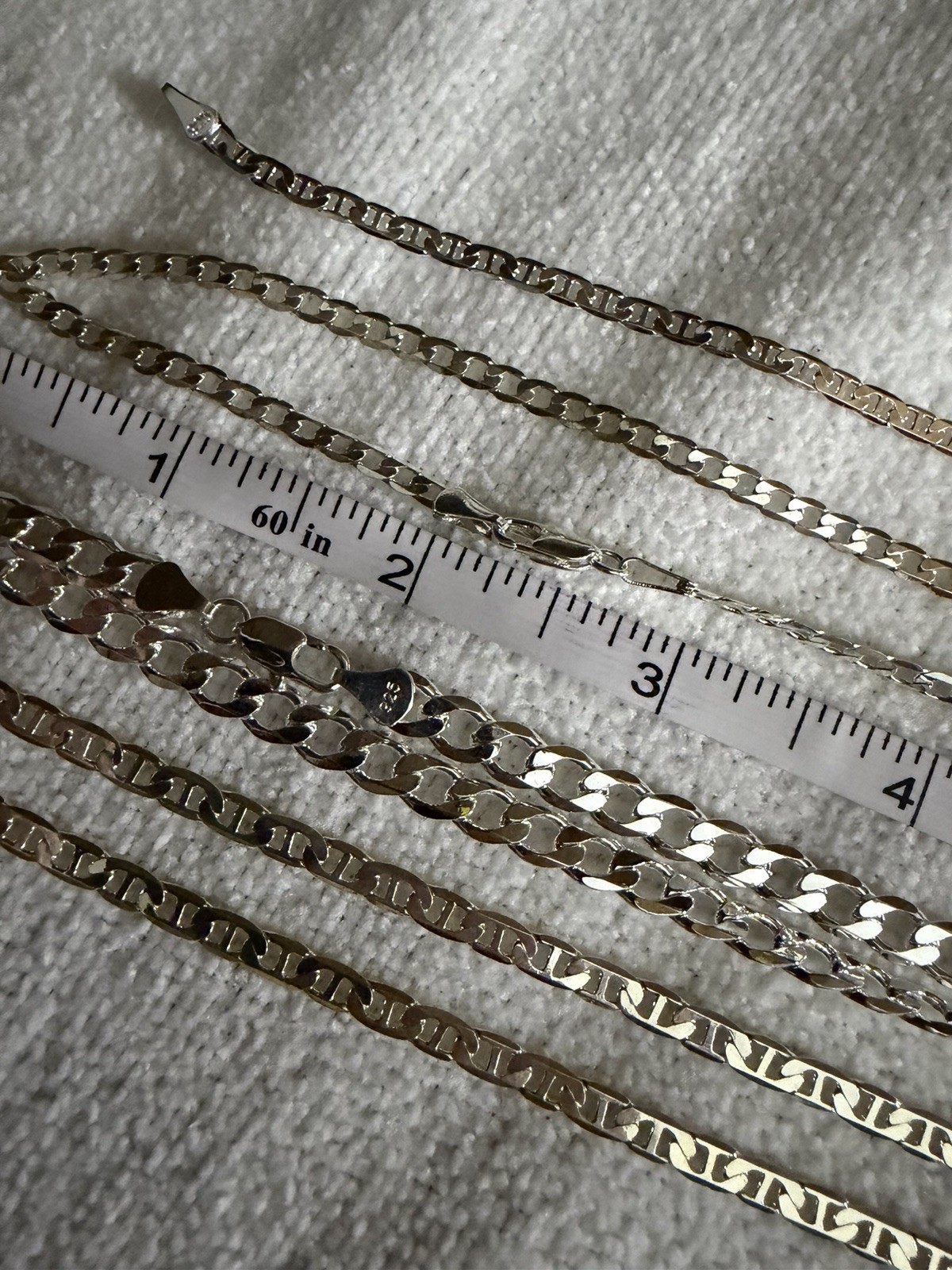 2-22” chains, 1-24” chain and 7” bracelet bundle, all 925 stamped