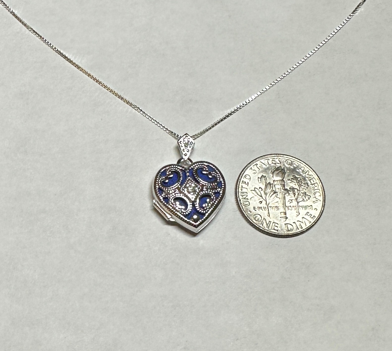 Ster Silver Rhodium-plated Genuine Diamond 15mm Filigree Heart Locket w/Chain