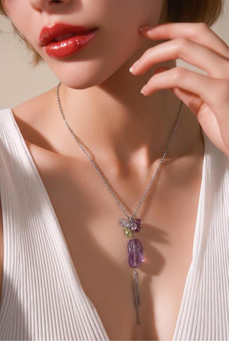 Long Silver Tone Chain Necklace with Large Purple Hard Plastic Crystal Pendant.