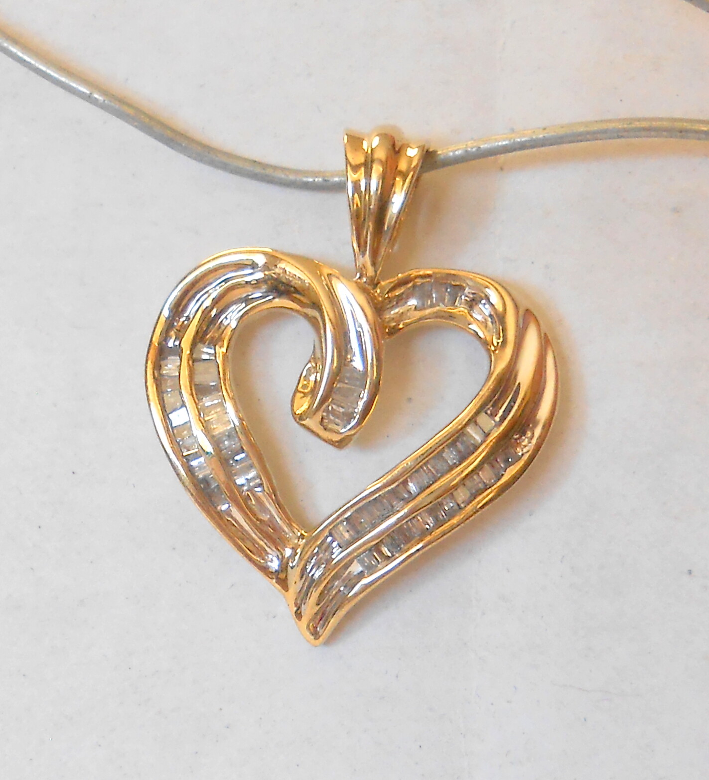 10k Yellow Gold Channel Set Baguette 1 TWD Carat Diamond Heart Pendant