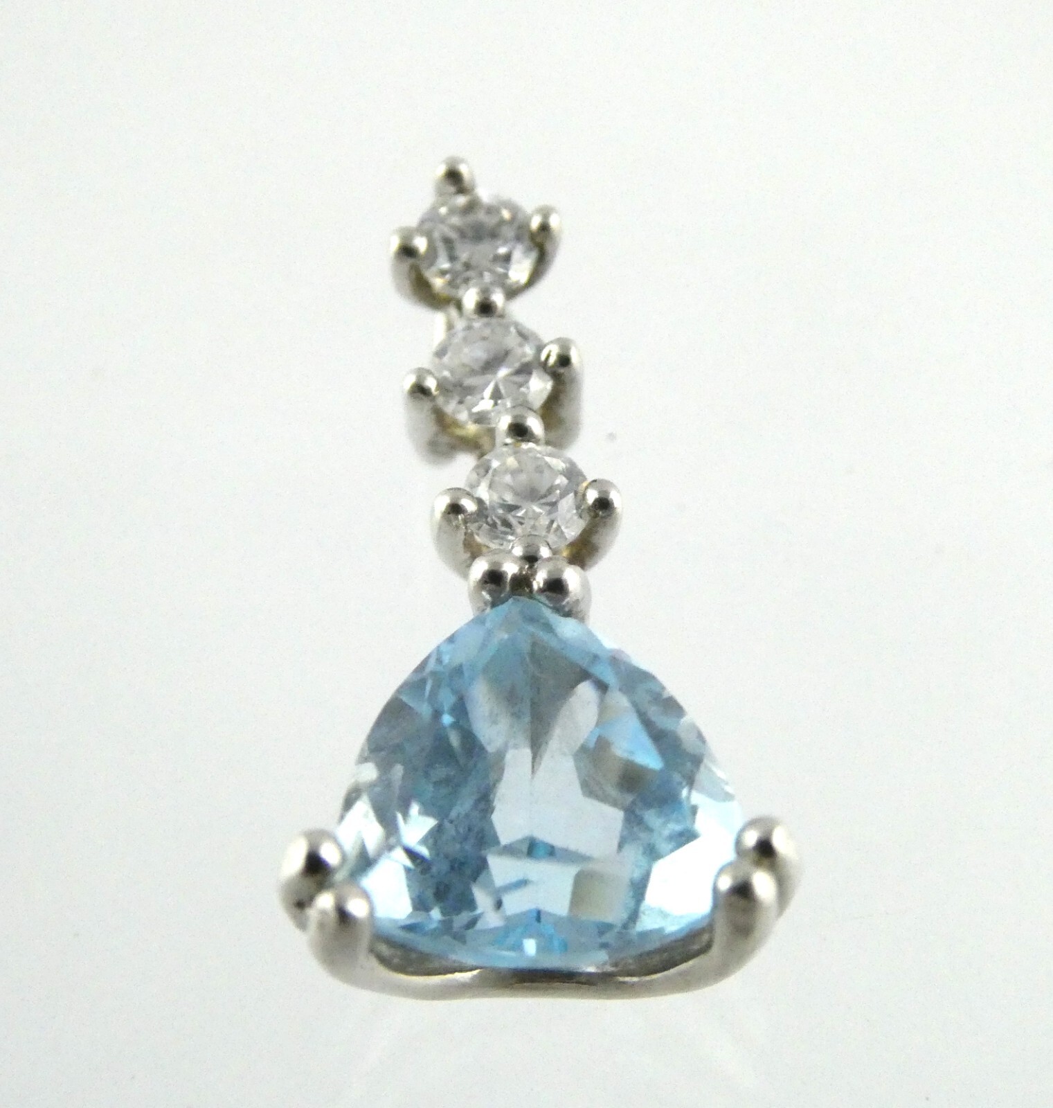Sterling Silver Blue Topaz White CZ Pendant Trillion and Round Cuts 925 .75 Inch