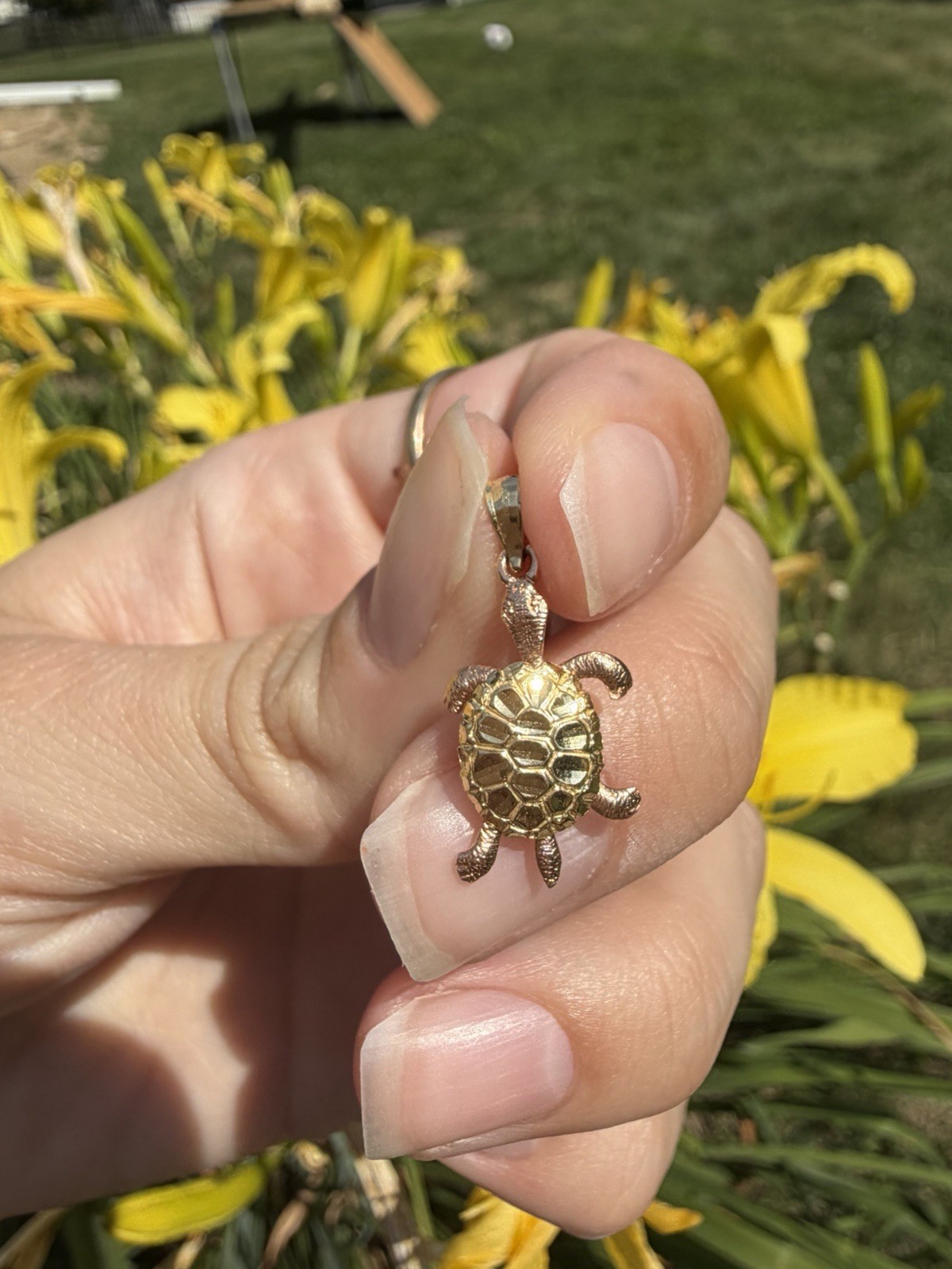 The most adorable 14k gold turtle pendant! The legs move- really a unique piece