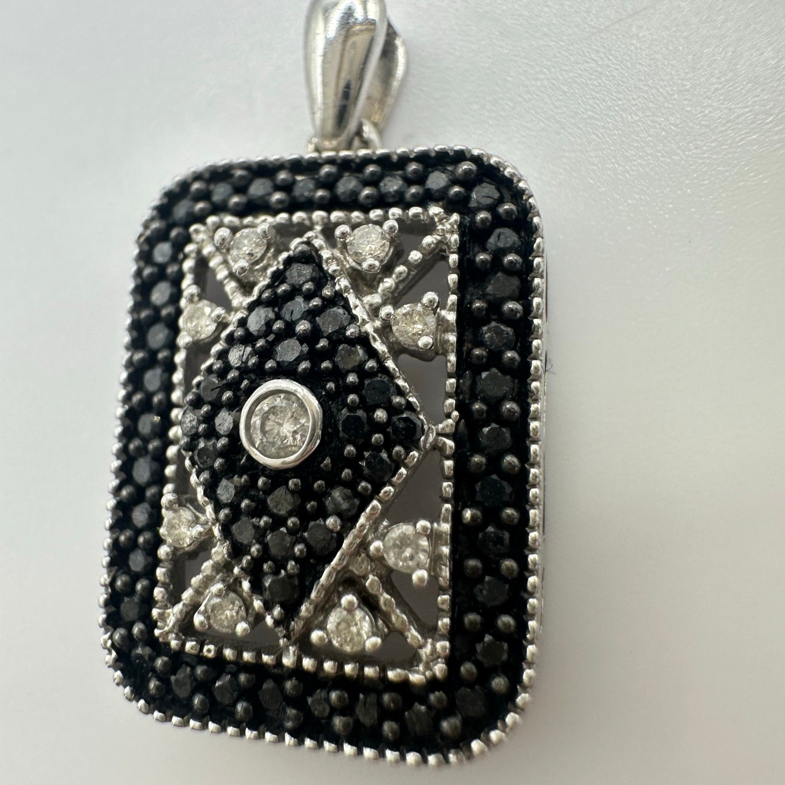 14kt solid white gold white black diamonds treated 0.50CTW pendant 3.13 grams