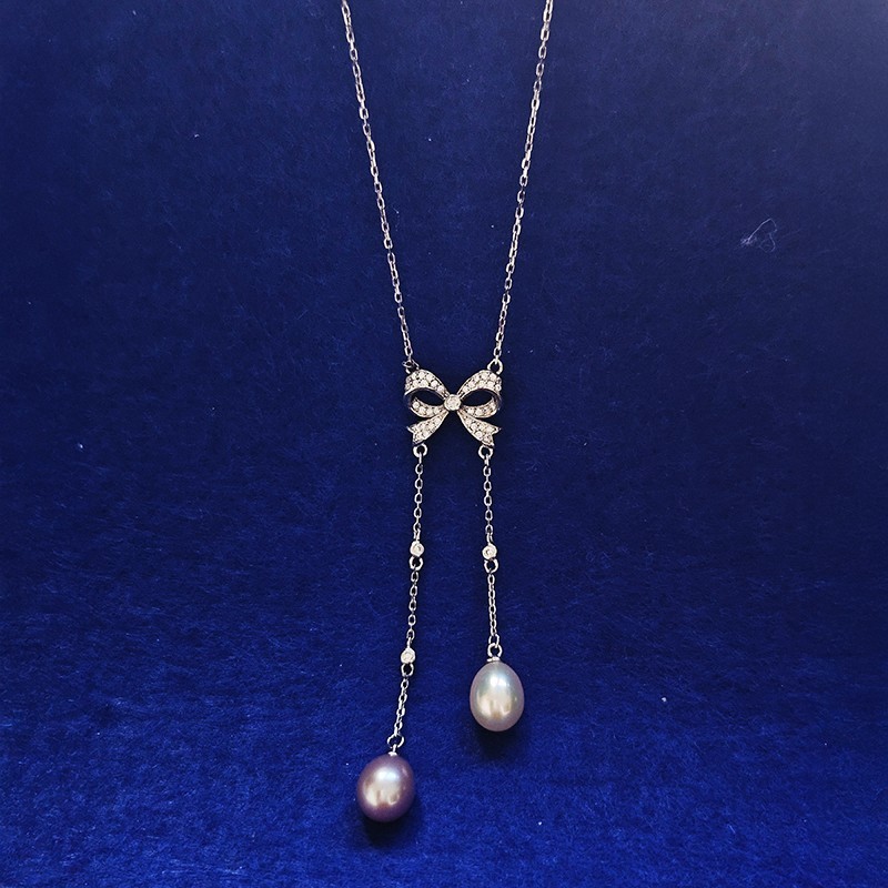 925 Sterling Silver Butterfly Knot with Fresh Water Pearl Tassels