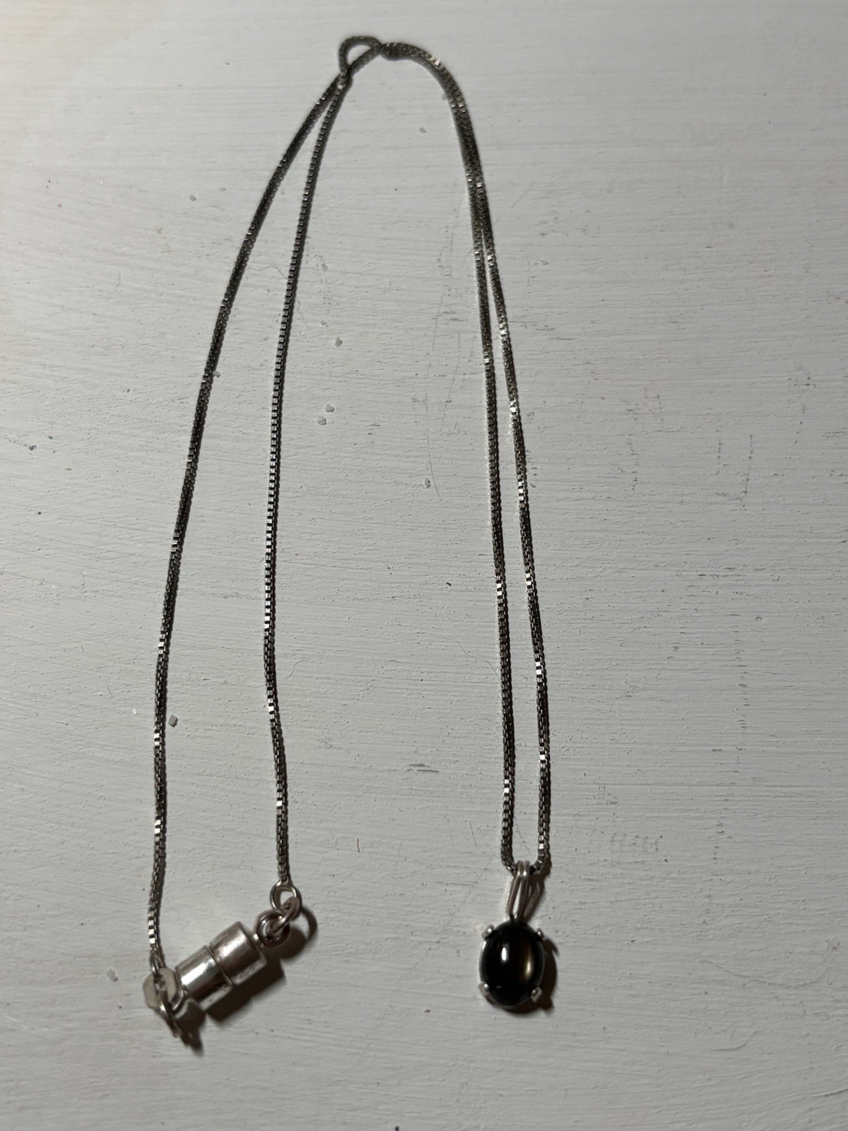 Black Star Sapphire Pendant on a 925 silver box chain