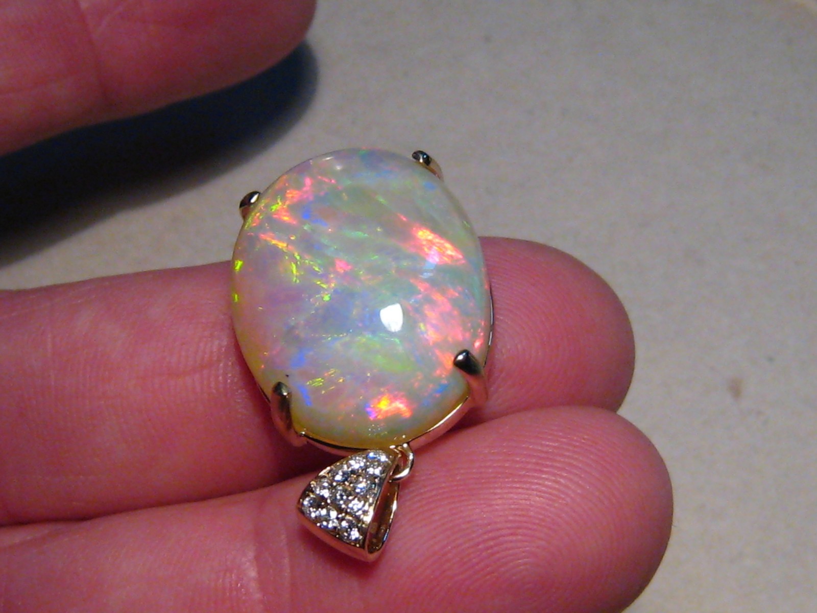 Large 25 ct Welo Opal & Diamond Pendant , Solid 14 k Gold , Brightness 5+