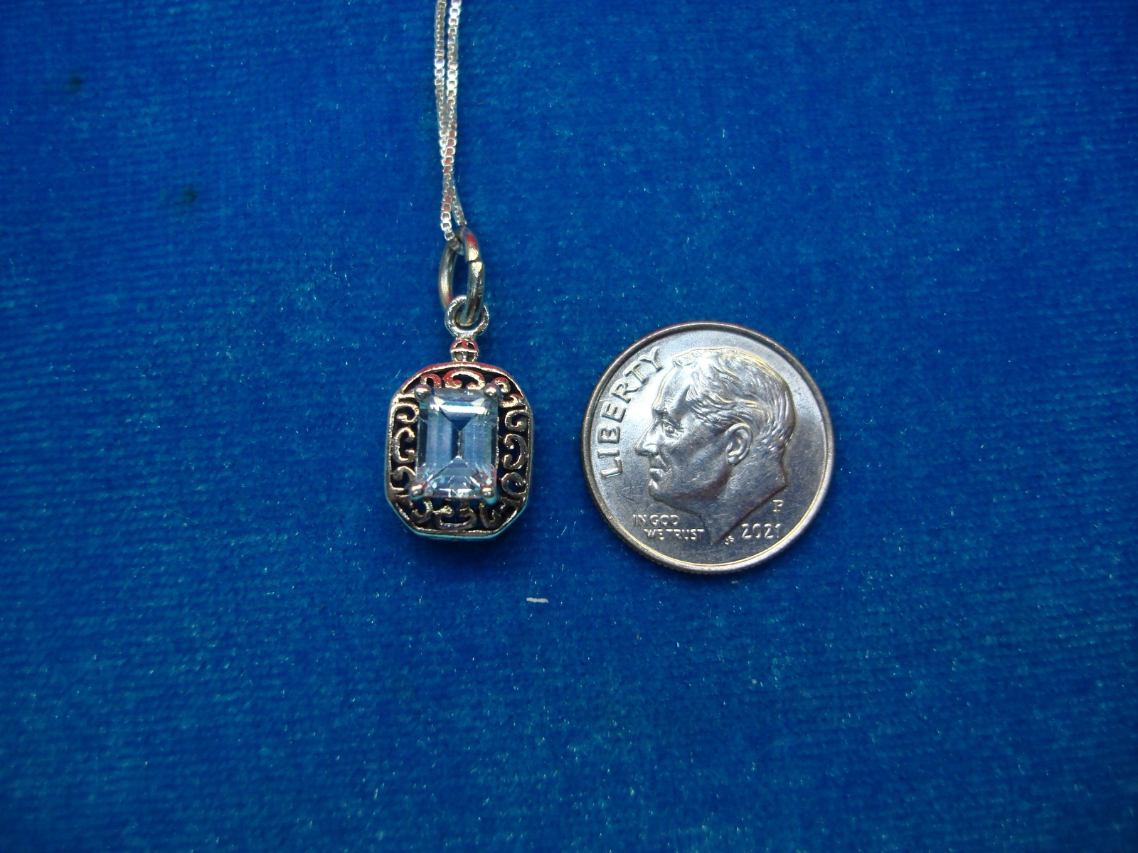STERLING SILVER FANCY PENDANT WITH LIGHT BLUE STONE & 18″ STER. BOX LINK CHAIN