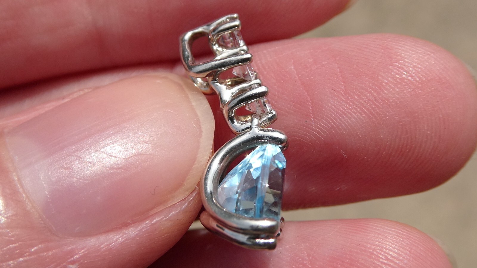 Sterling Silver Blue Topaz White CZ Pendant Trillion and Round Cuts 925 .75 Inch