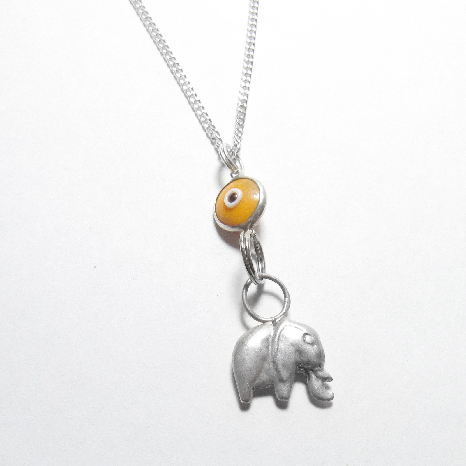 Sterling Silver Orange Glass Evil Eye Spirit Animal Elephant Pendant With Chain