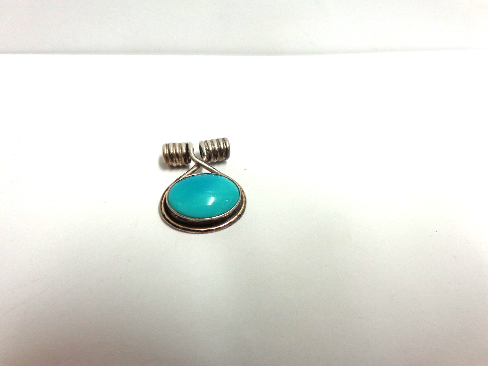 sterling silver turquoise pendant by G sz 7/8 in lg wgt 2.9 grams tcw 3