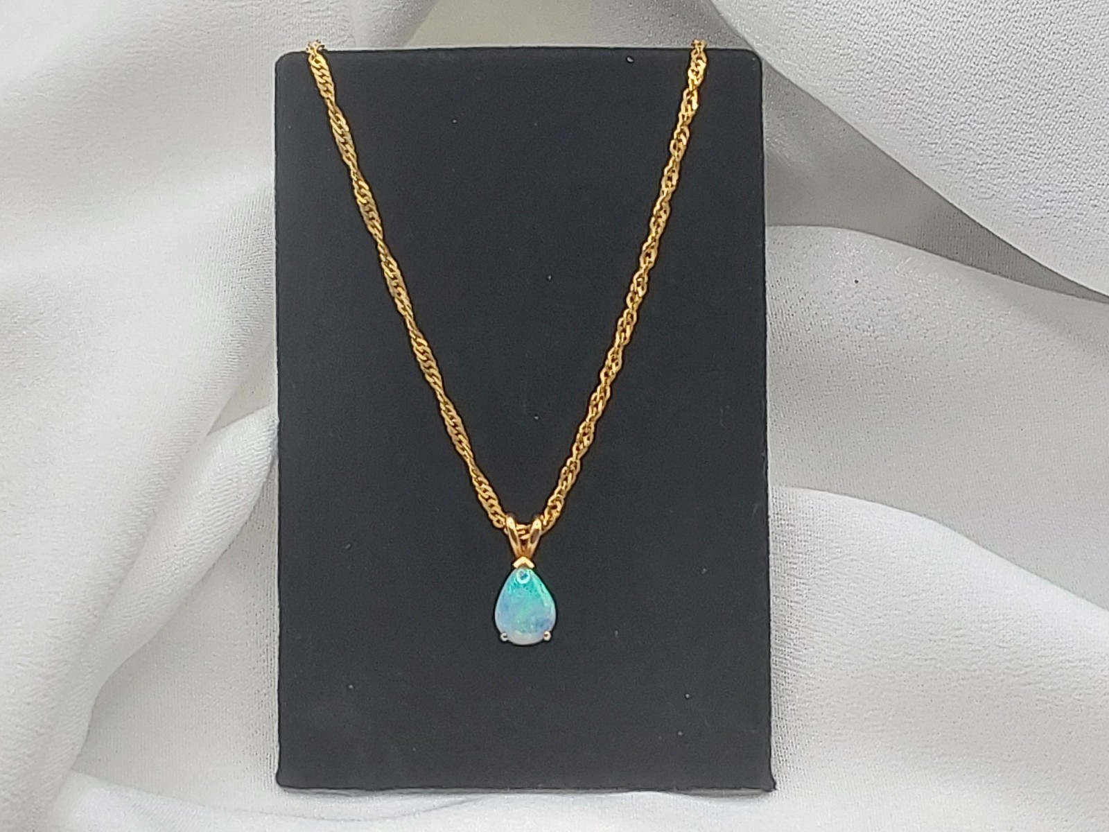 9X7 mm Pear-Shaped Opal Pendant in 14K Yellow Gold