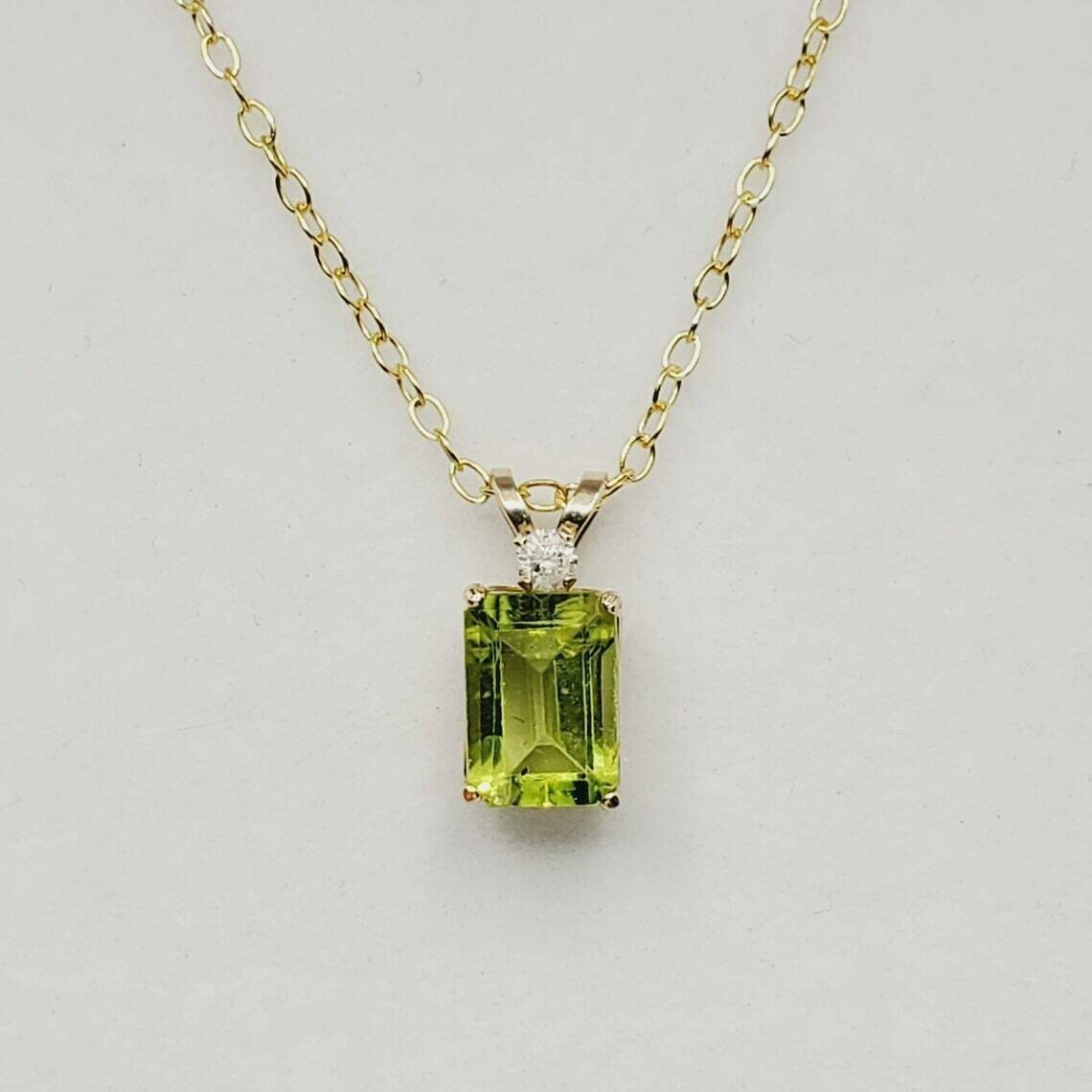 2Ct Emerald Cut Green Peridot Solitaire Women Pendant 14K Yellow Gold Free Chain
