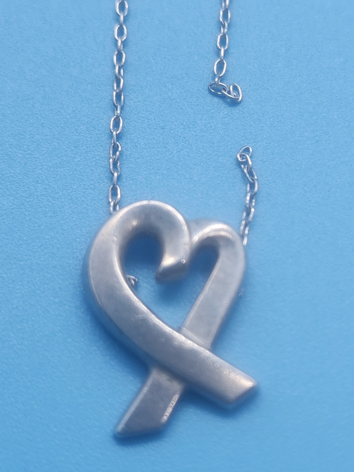 READ DESCRIPTION:Tiffany & Co. Paloma Picasso Loving Heart Ribbon Pendant