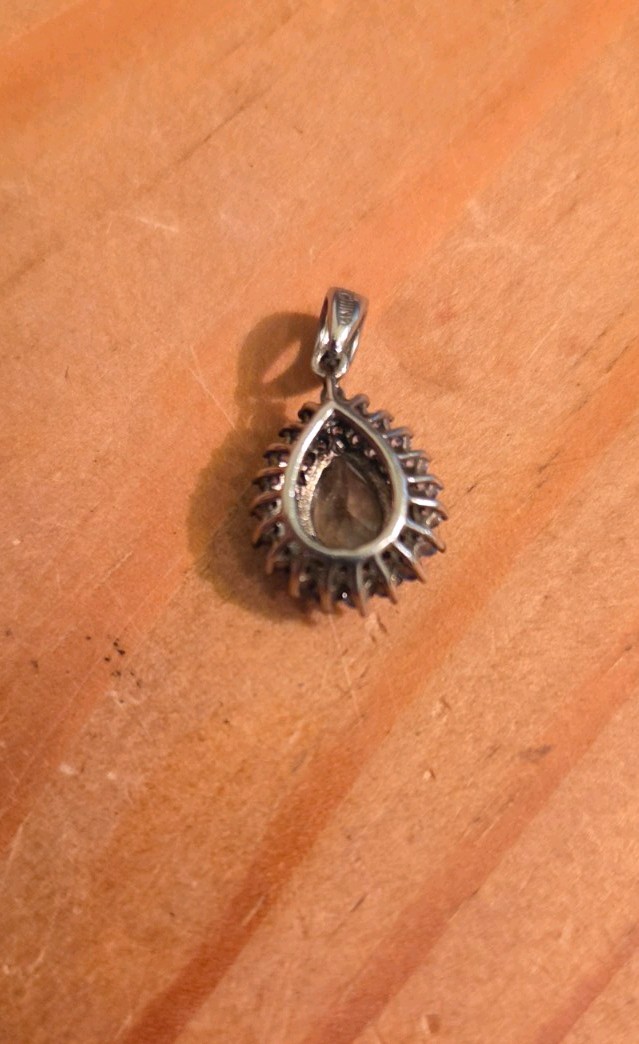 Sterling Silver Blue Topaz Pendant . Tear Drop Shaped. Marked 925 RUF China