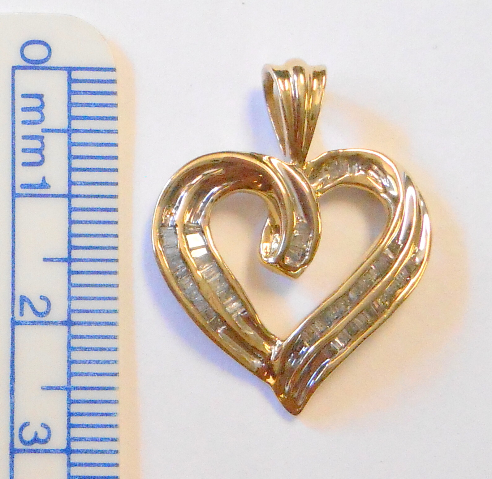 10k Yellow Gold Channel Set Baguette 1 TWD Carat Diamond Heart Pendant