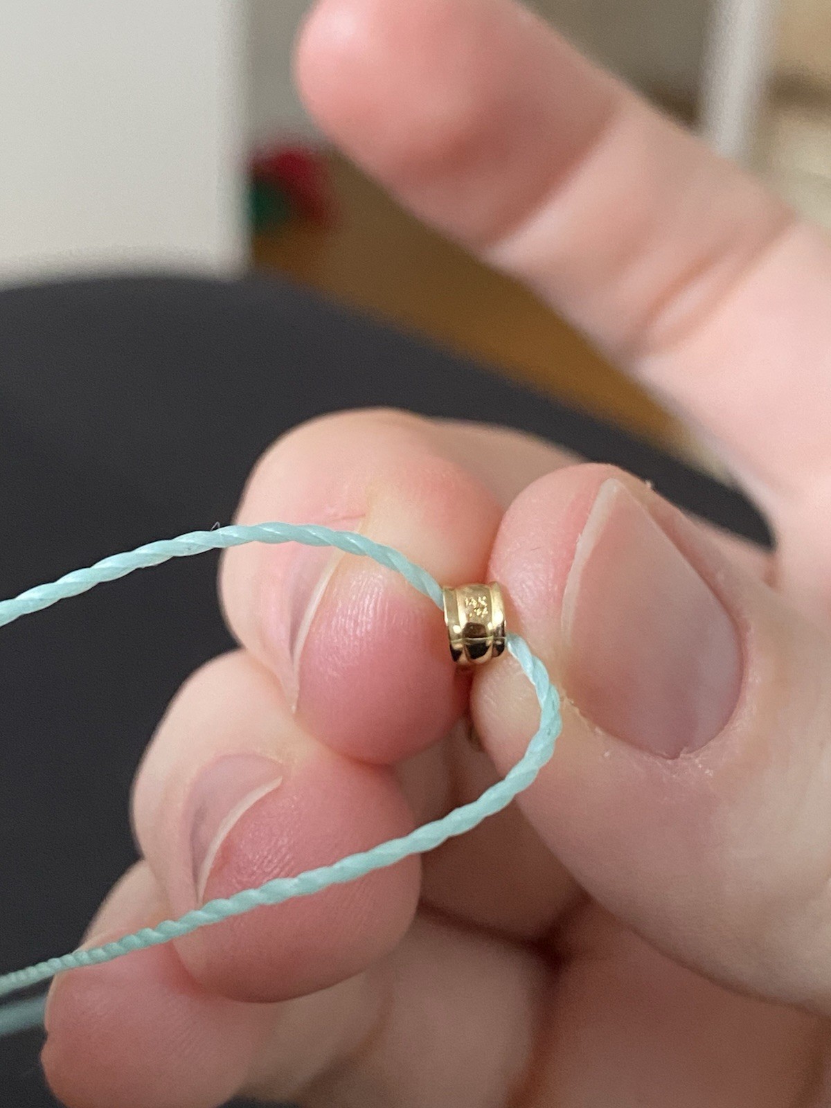 Beautiful Turquoise Pendant Set In 14K Yellow Gold On A Blue Cord