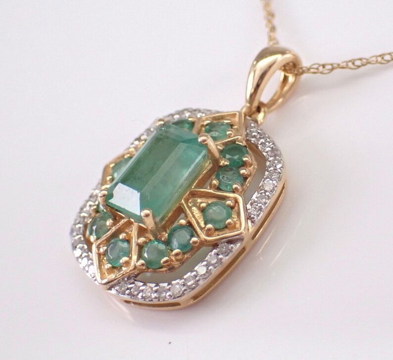 2.2Ct Emerald Cut Lab Created Emerald Halo Pendant 14K Yellow Gold Plated Silver