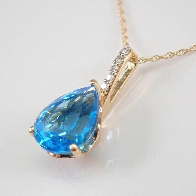2.50Ct Pear Cut Lab-Created Blue Topaz Teardrop Pendant 14K Yellow Gold Plated