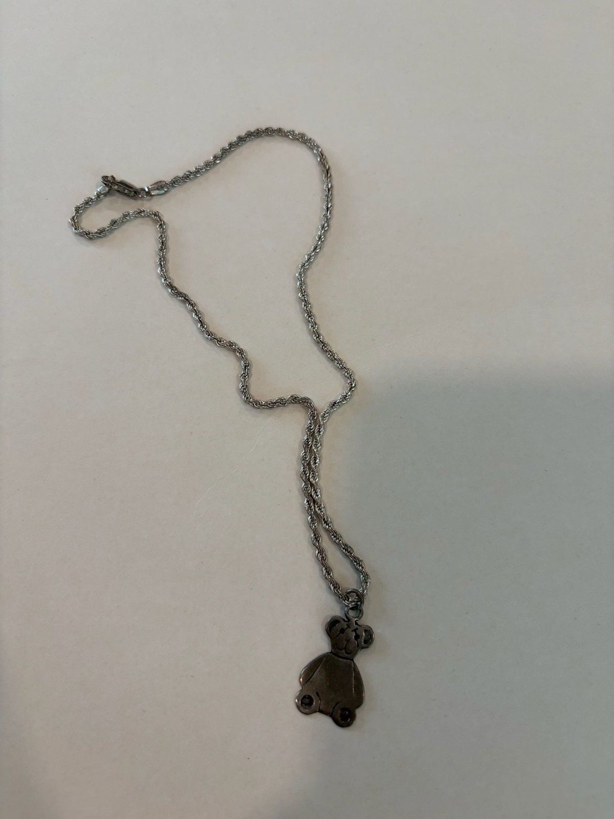 Assorted Jewelry and a Sterling Silver Chain including Teddy Bear and Dog Charms