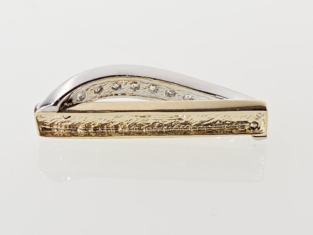 14K Two Tone Gold APX 1/10 CTW Round Diamond Pendant (AM1096455)