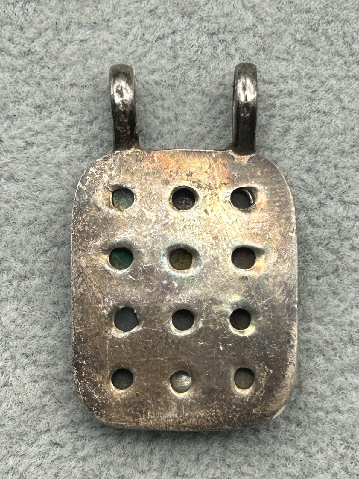 Multiple gemstone pendant.
