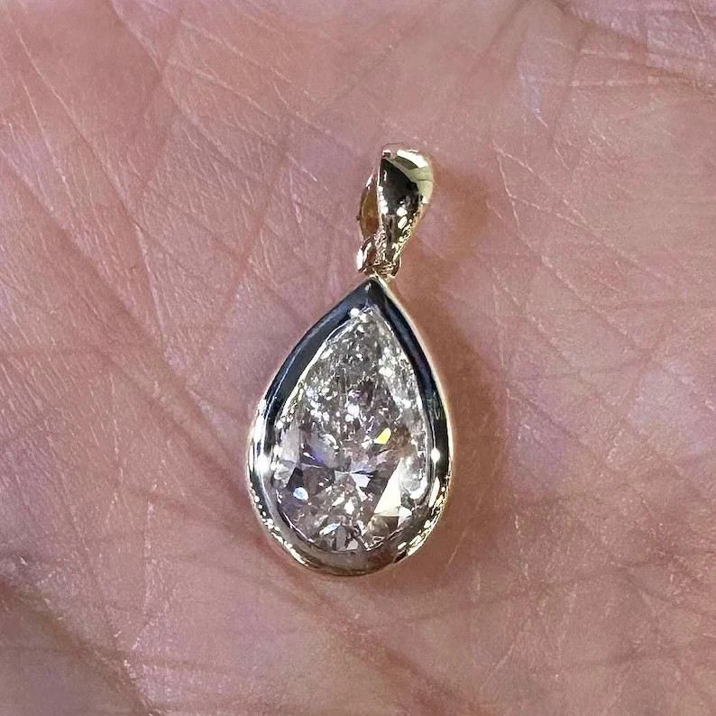 2Ct Pear-Cut Moissanite Bezel Women’s Pendant Necklace 14k White Gold Plated
