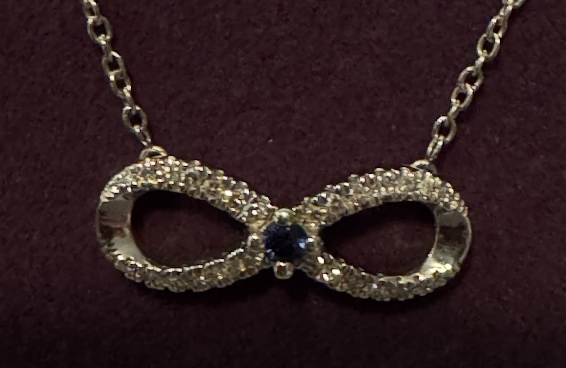 Vera Wang Infinity Pendant Necklace Sapphire And Diamonds.