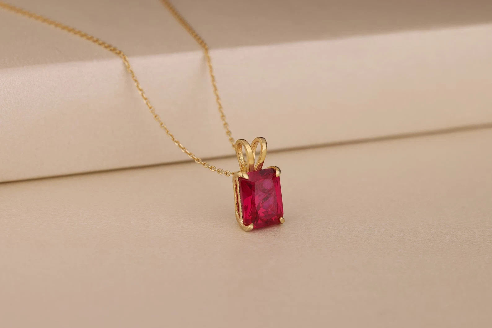 2Ct Emerald Cut Lab Created Ruby Women’s Charm Pendant 14K Yellow Gold Plated