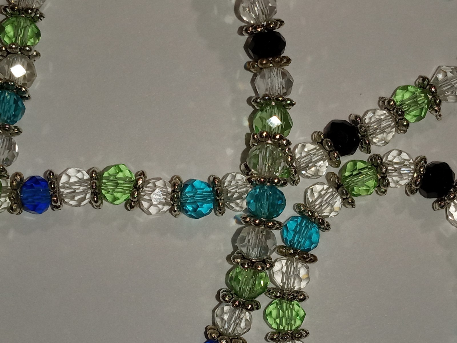 Beautiful Magic Crystal Necklace in Blue, Black, Green and Transparent, Silver