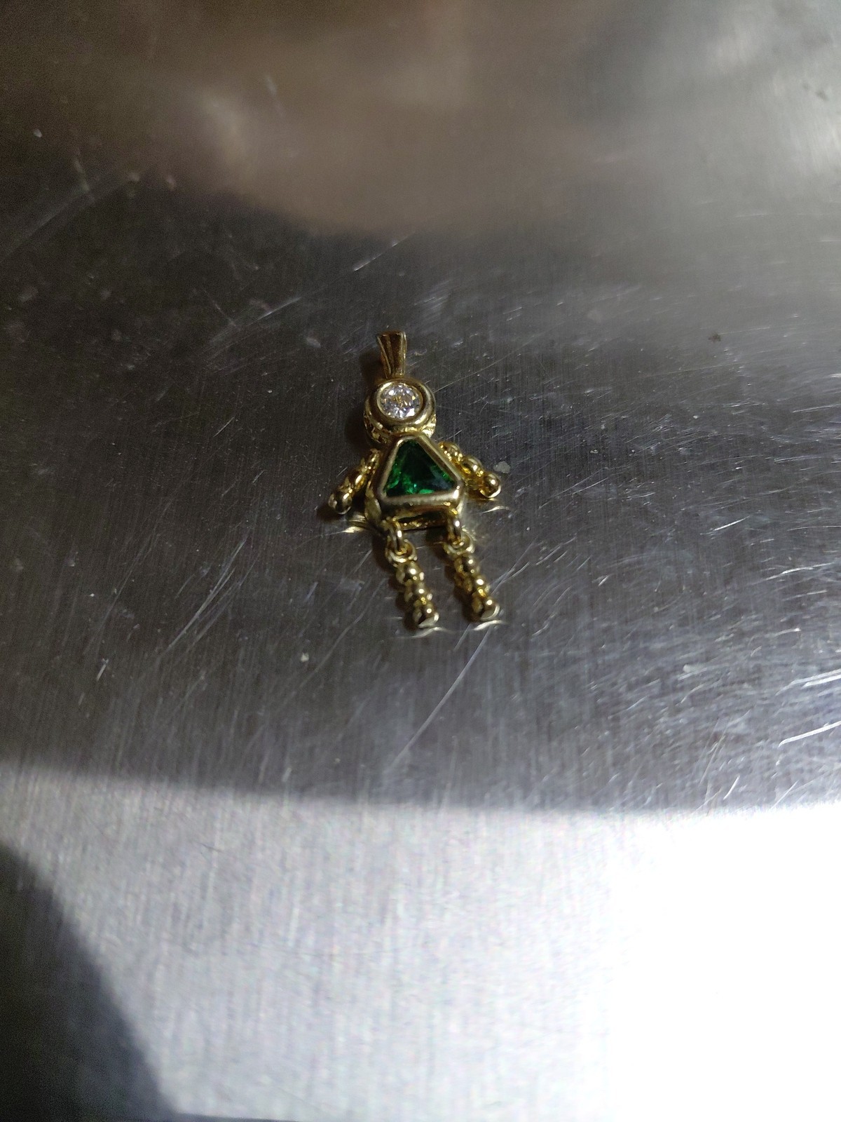Gold Colored Sterling Silver Girl Figure. May Birthstone.
