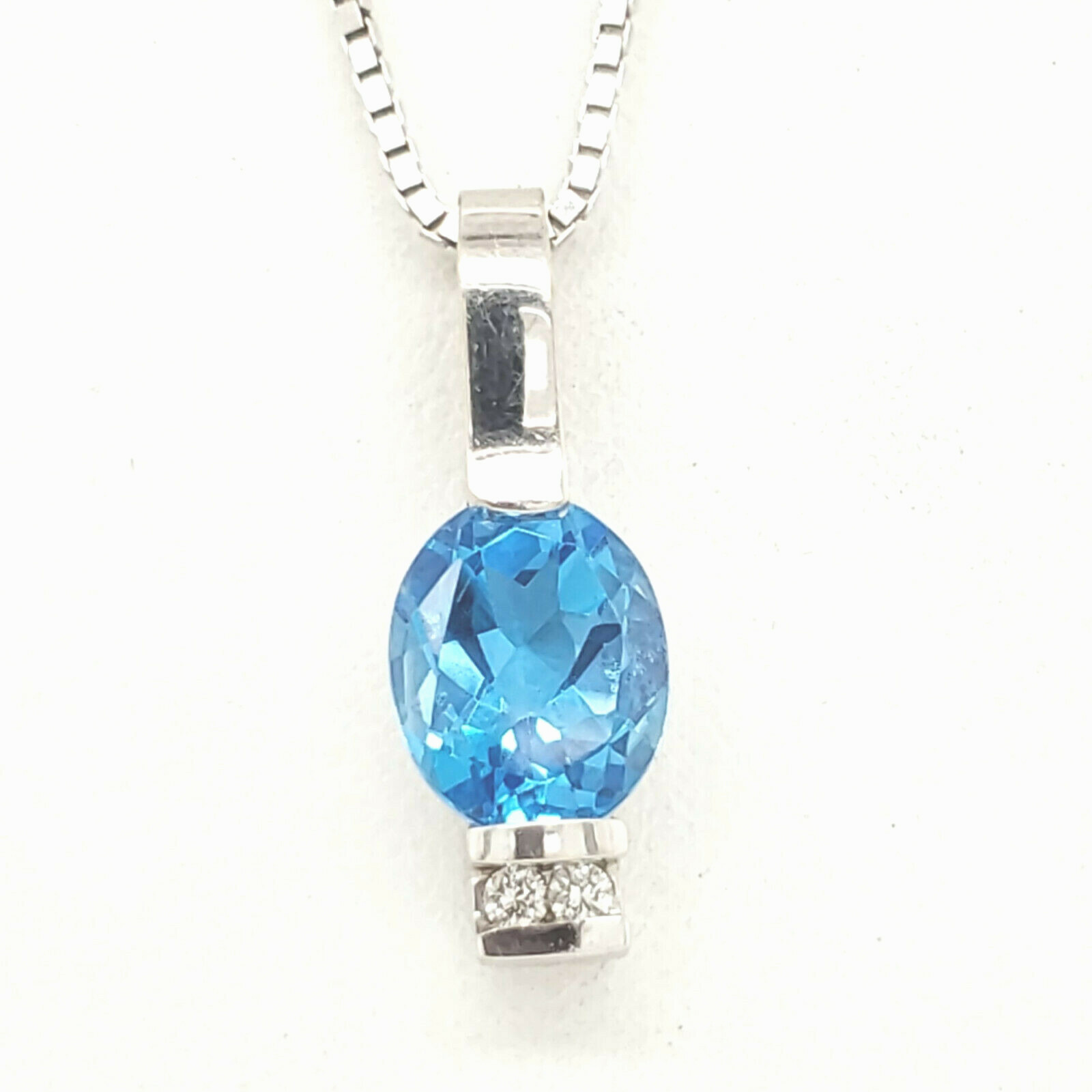 Oval London Blue Topaz 9×7 Diamond .03tcw14k white gold Statement Necklace 20″