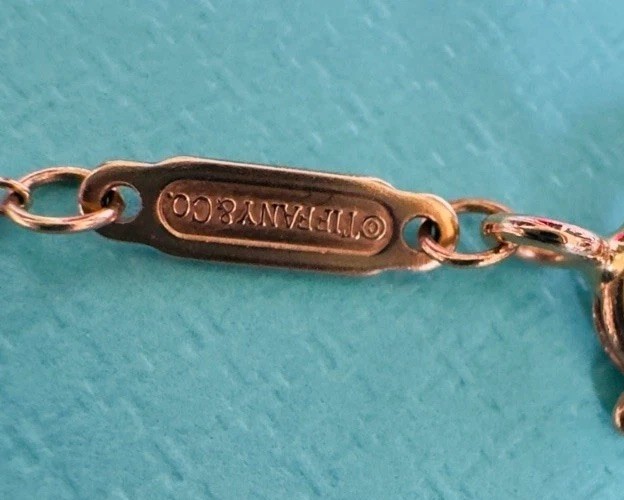 Tiffany & Co. 18k Yellow Gold Small T Smile Pendant Necklace 16.5” or 18.3”