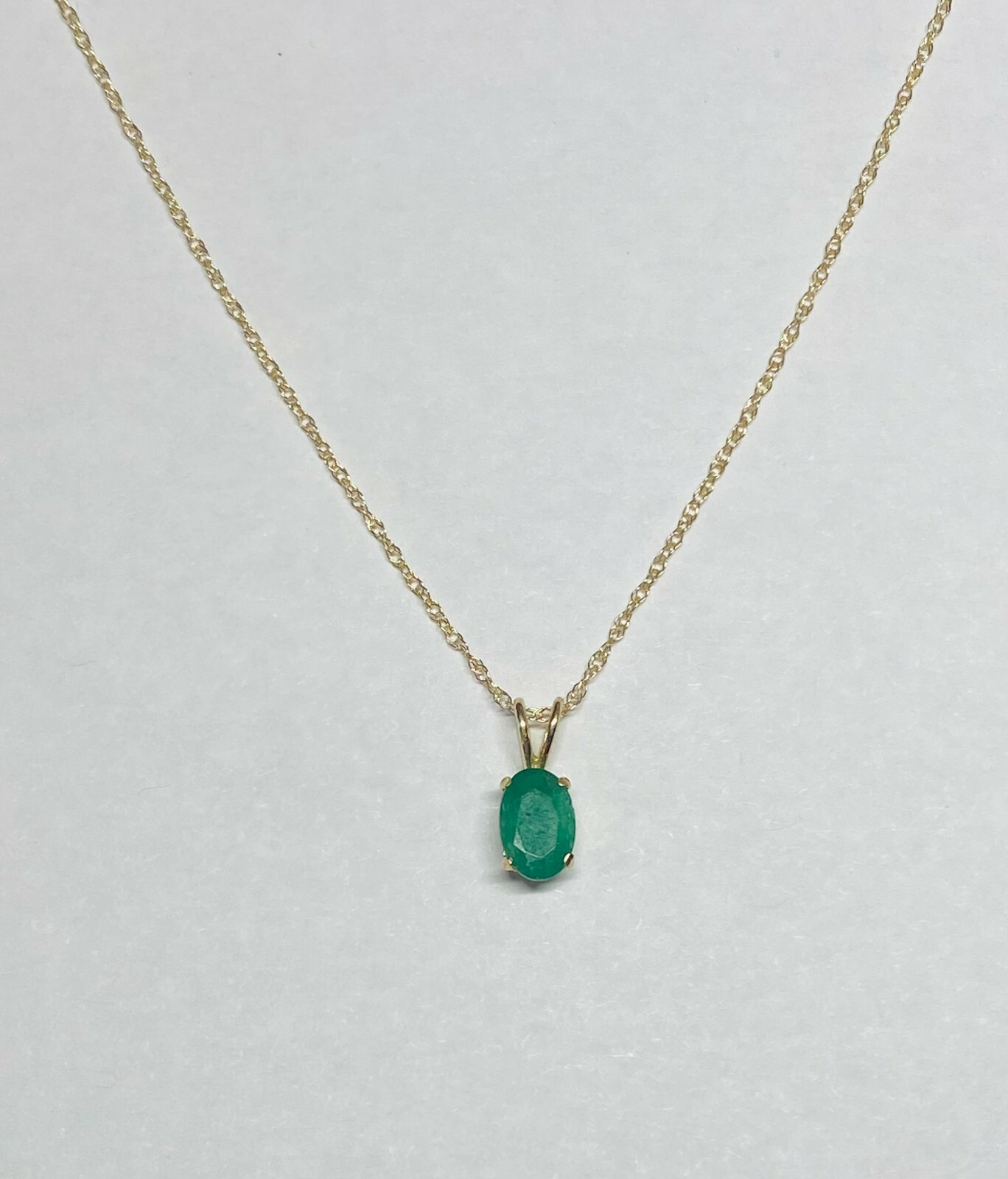 14 Karat Yellow Gold Genuine 6 x 4mm Oval Emerald Pendant (Available w/ Chain)