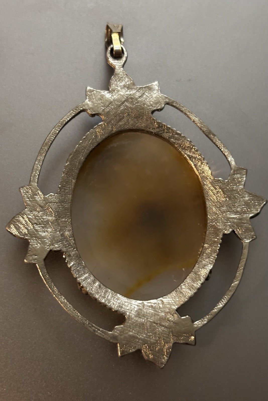 Large Oval-Shaped Cabochon Agate Set In A Silver-Tone Metal Frame